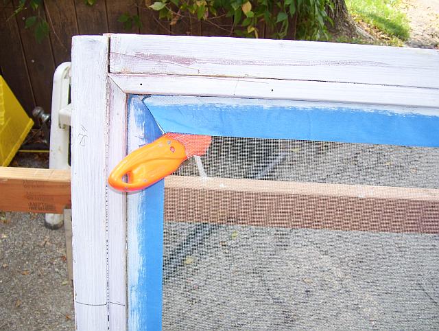 The disaster - a utility knife slipped and penetrated the new screen wire.